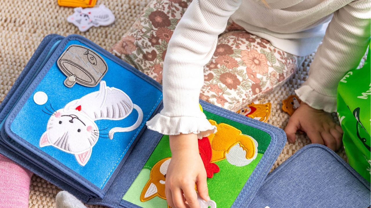 How to Incorporate Sensory Play into Your Child's Routine with a Fabric Busy Book?
